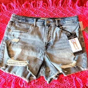Sofia Vergara 3.5" distressed hem denim size 6